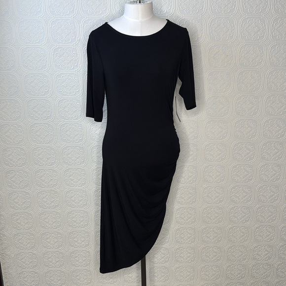 Steal Your Attention Black Bodycon Dress, Size M NWT
Lulus - Picture 10 of 14